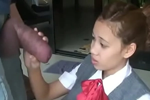 Oriental schoolgirl opens near less suck giving cock