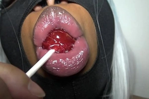 This is dslaf- dominican lipz asmr lollipop sucking with dig up sucking lips