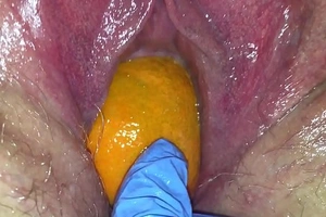 Tight twat milf receives her twat destroyed yon a orange and big apple popping it parts of her tight hole making her spew